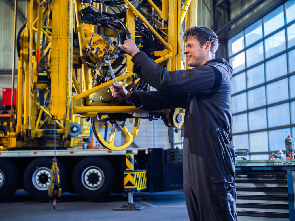 Spierings Service Engineer working on a mobile tower crane